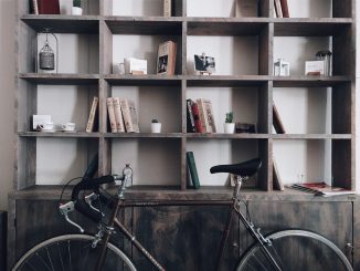 bicycle leaning on shelf